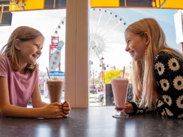 Kids drinking milk shakes at the Clifton Hill restaurant.