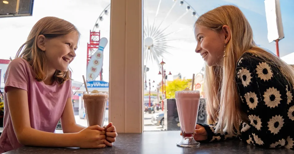 Kids drinking milk shakes at the Clifton Hill restaurant.