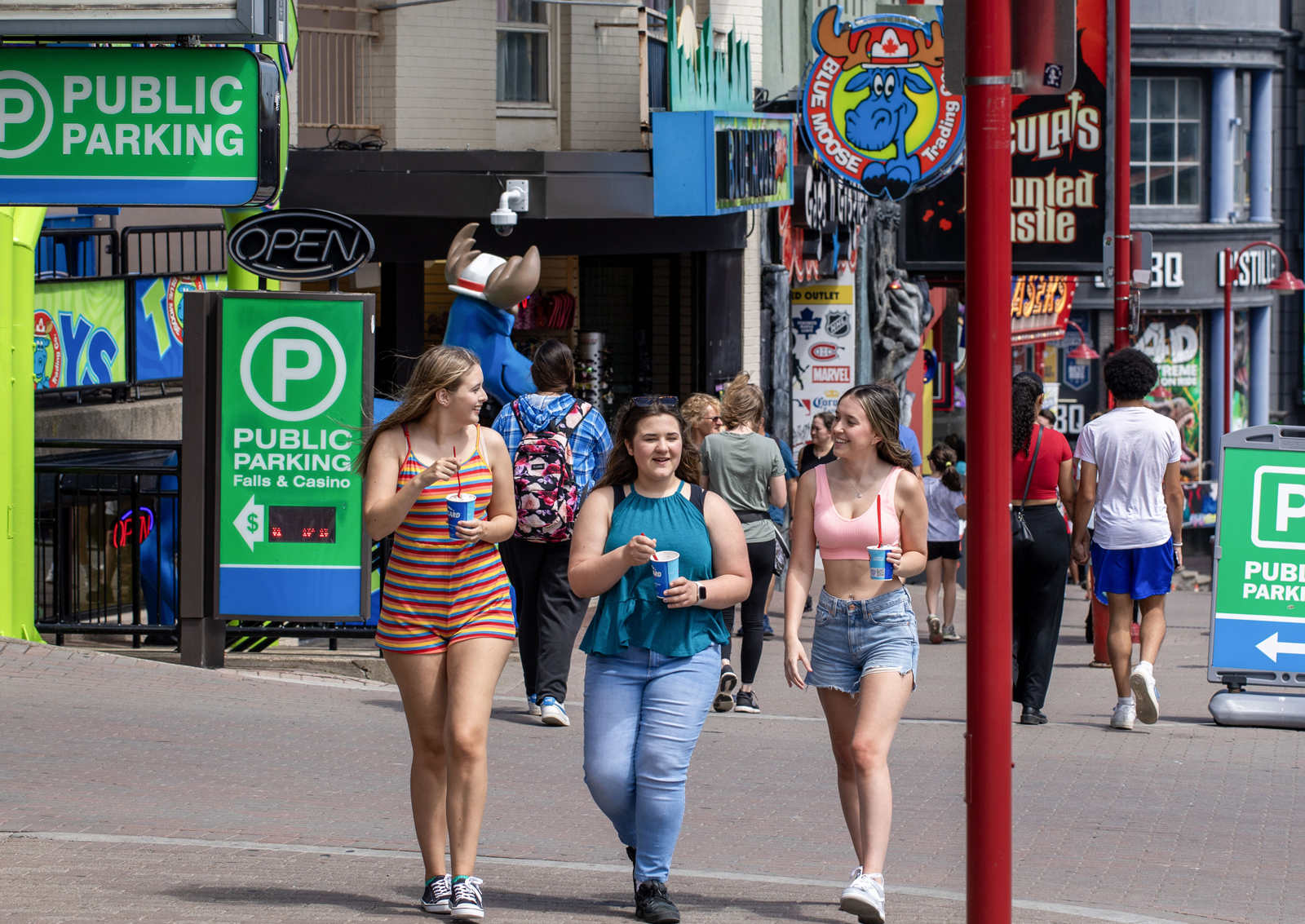 Group of teens walking together on Clifton Hill